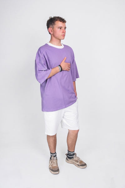 Camisa oversize de algodón en color morado de la marca JOBAN, con estilo relajado y tejido suave visible en la imagen.